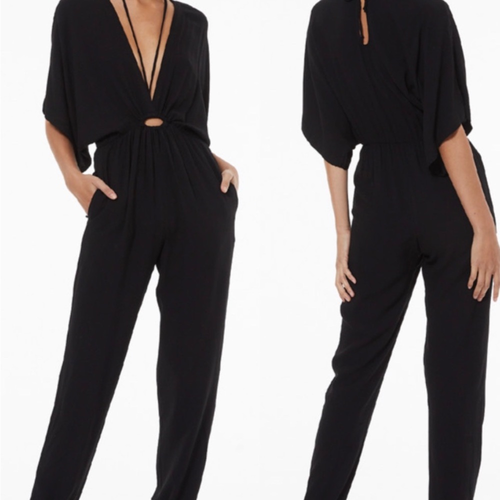 Never been worn YFB Norma Jumpsuit in black
V neck 
Beautiful